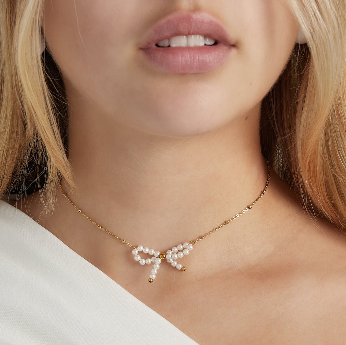 Ketting bow | goud